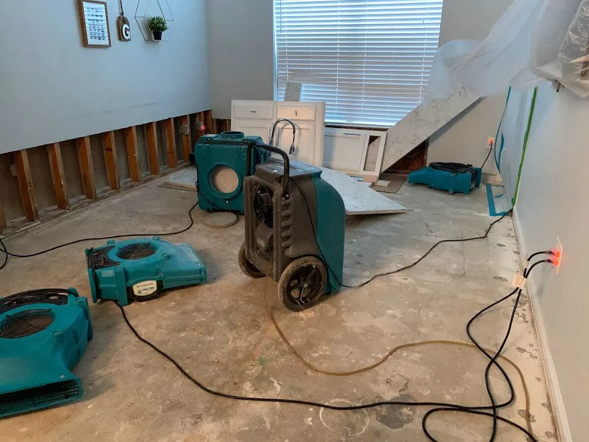Dehumidifier in flood-cut room for Water Damage Restoration in Litchfield Beach