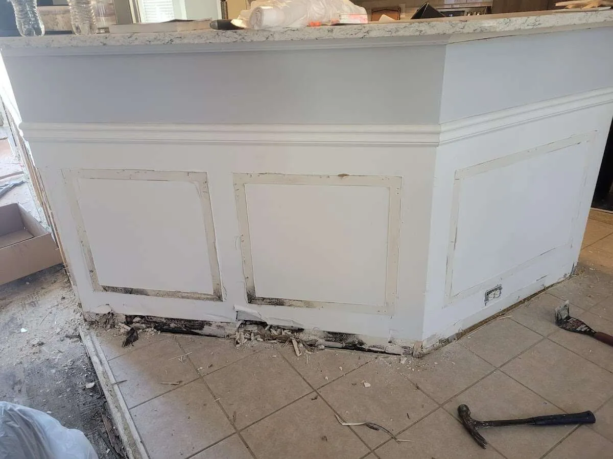 Water damage and mold on kitchen during Burst Pipe Cleanup in Litchfield Beach